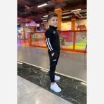ست گرمکن و شلوار ورزشی بچگانه طرح پوما مشکی دورس دو نخ مناسب 5 تا 12 سال - تصویر 2